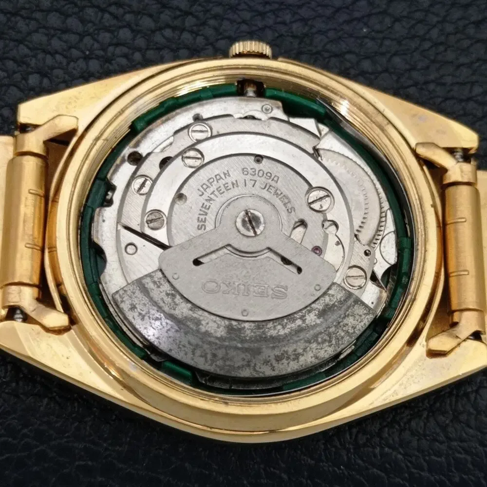 Vintage 1979 Seiko Automatic Mens Gold Watch W/daydate & Green accents
